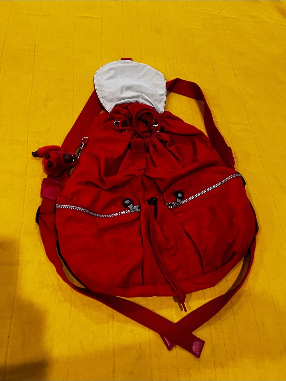 Kipling Lovebig Red Drawstring Backpack with Front Zip Pockets